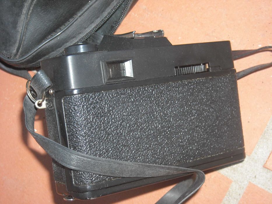 Maquina fotografica antiga de rolo em bom estado