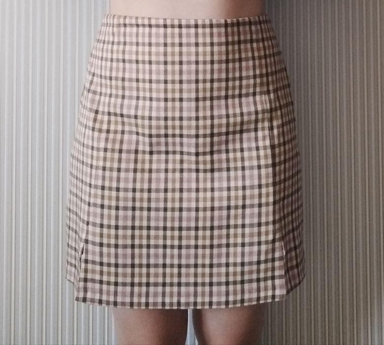 Спідниця бежева у клітинку