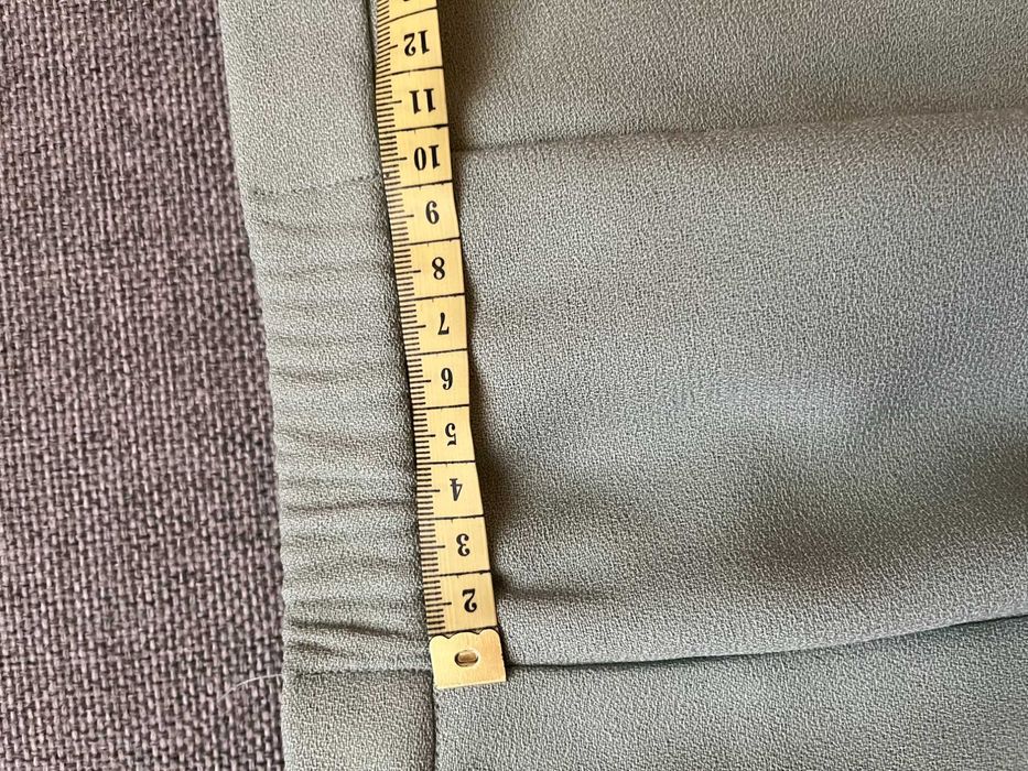 Zielonkawa garsonka firmy SUITSME