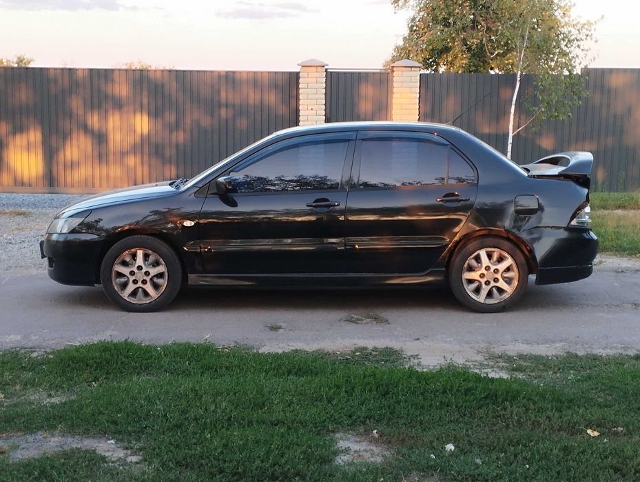 Mitsubishi Lancer 9 2.0 газ бензин чёрный