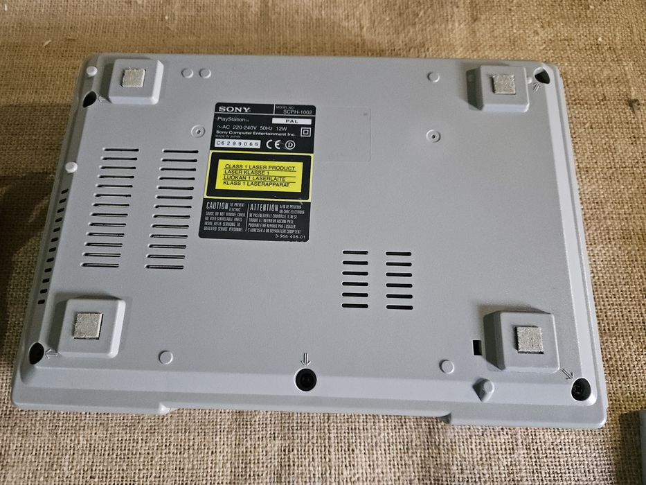 Consola ps1  com um jogo