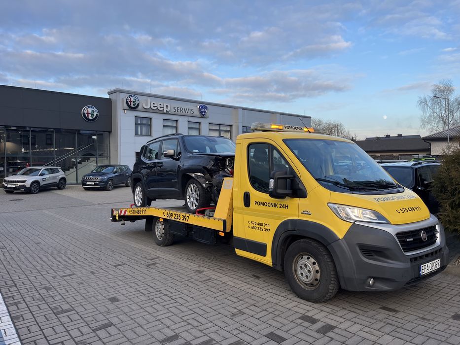 Pomoc drogowa Pabianice laweta s8 s14 holowanie do 14 ton Pomocnik