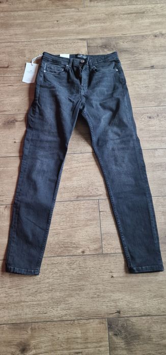 Nowe, damskie, czarne jeansy CROSS rozm. 31