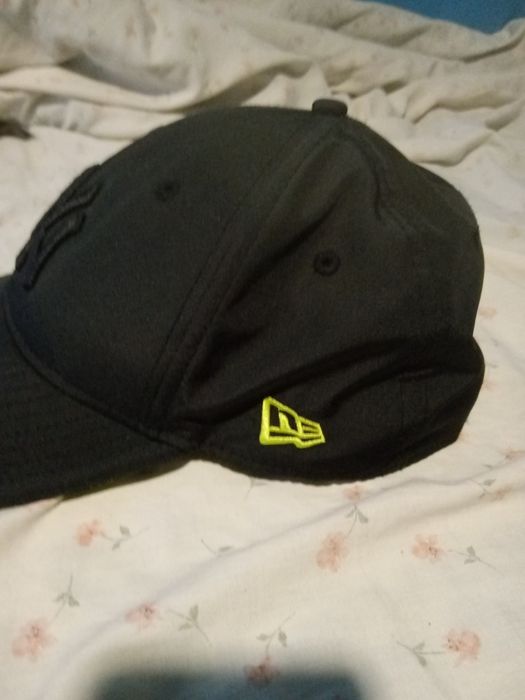 Boné marca newera  como novo