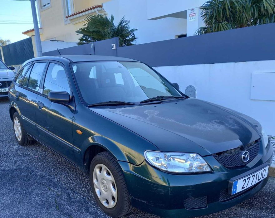 mazda 323 f bom e barato