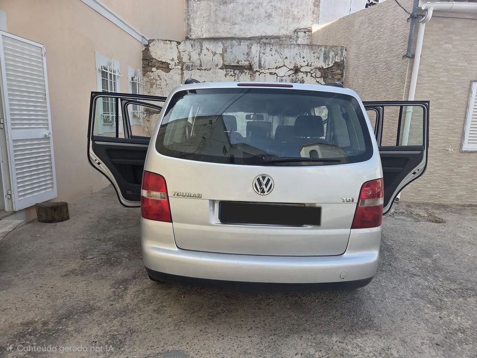 VW Touran 1.9 TDi Highline 7L foto 3