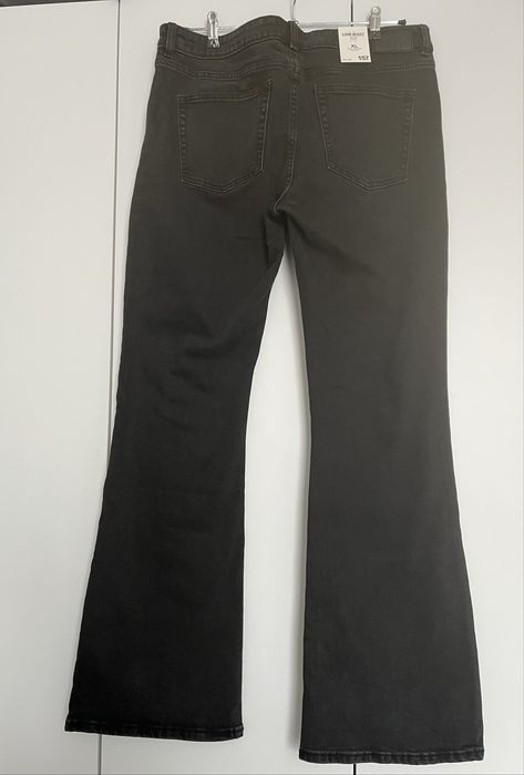 Темно сірі кльошові джинси р XL