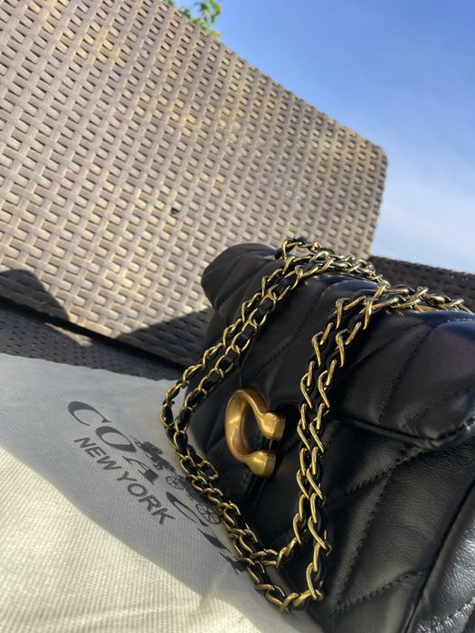Bolsa coach preta
