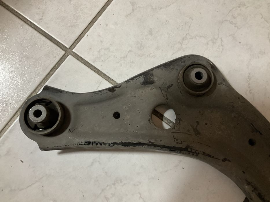 Braço direito Nissan J11