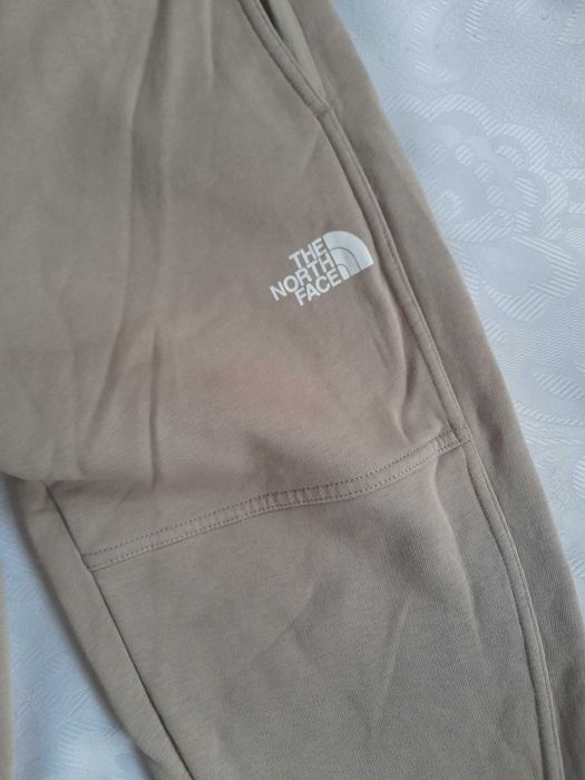 spodnie dresowe damskie the north face super stan