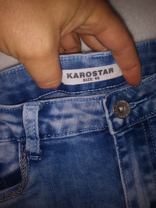 Spodnie jeans 40.        14