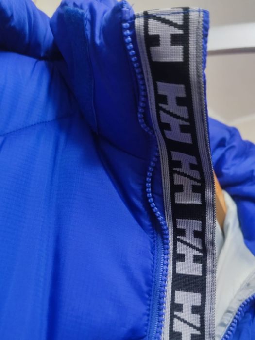 Męska kurtka puchowa L marki Helly Hansen w intensywnym kolorze nieb