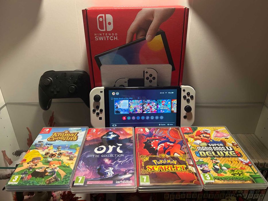 Nintendo Switch Oled + 4 jogos + comando+ bolsa+ caixa –Excelente estado