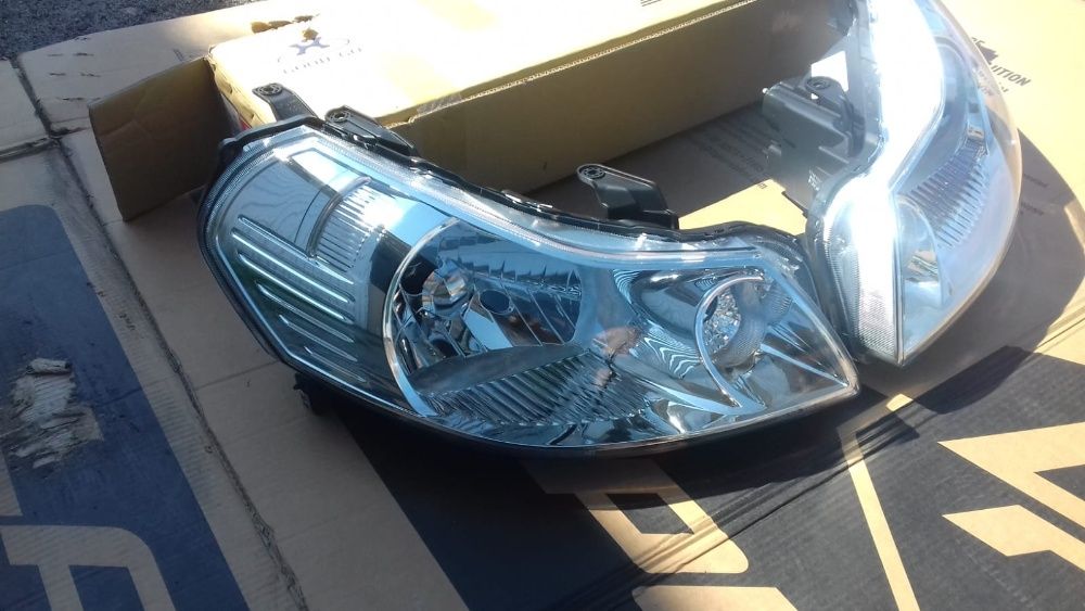 SUZUKI SX4 06 - lampa przednia lewa nowa