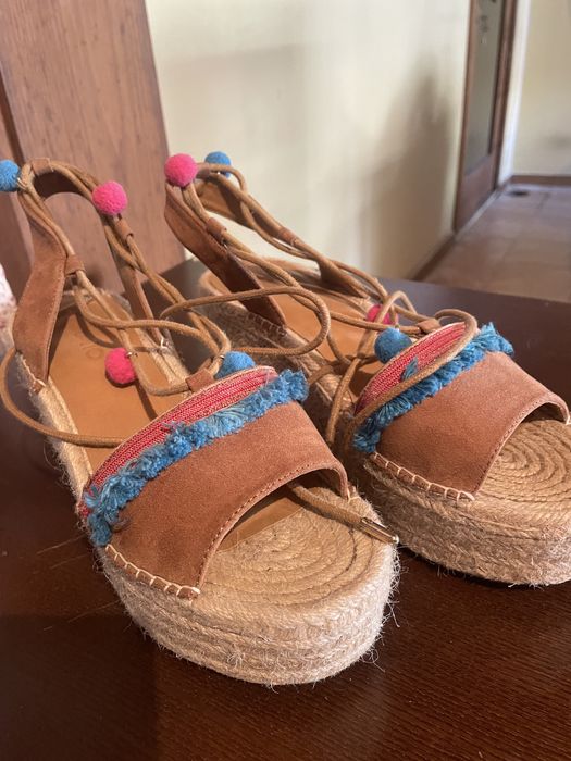 Sandálias como novas
