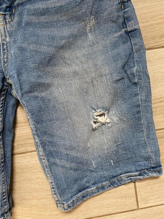 Spodenki jeansowe damskie niebieskie krótkie z dziurami