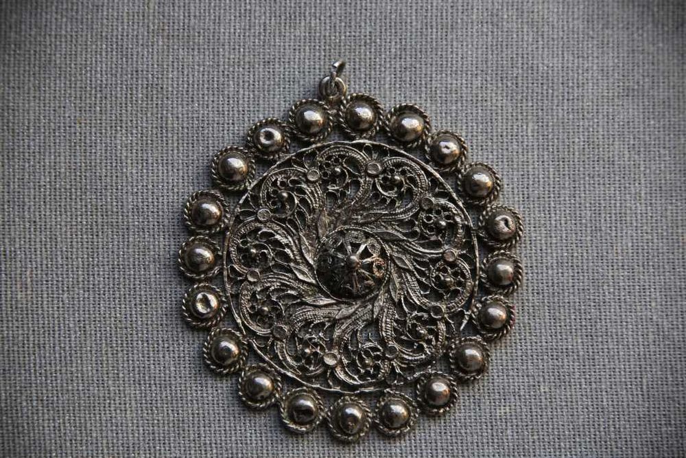 Medalhão prateado