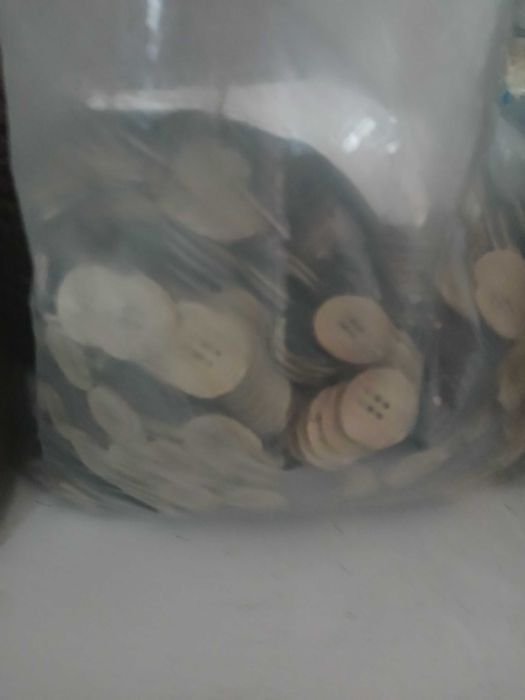 Sacos de botões novos