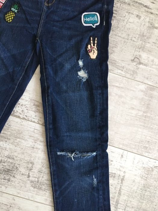 Nowe spodnie jeansowe z naszywkami Mohito xs 34