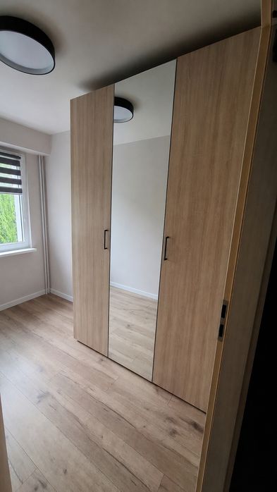 Pojemna szafa 150 cm (Dąb Sonoma/Biała) z lustrem – stan bdb! (2 sztuki / komplet)