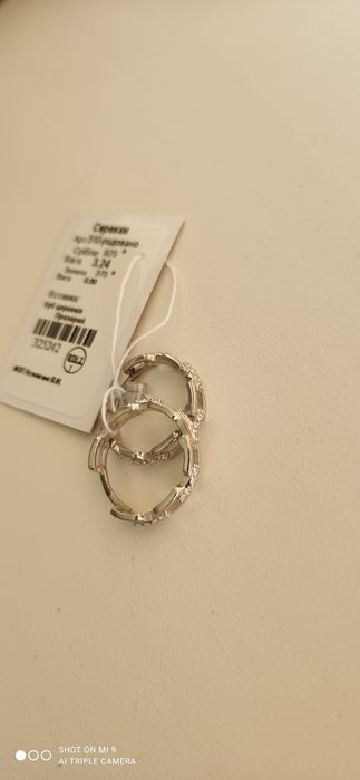 Продам нові срібні сережки кільця