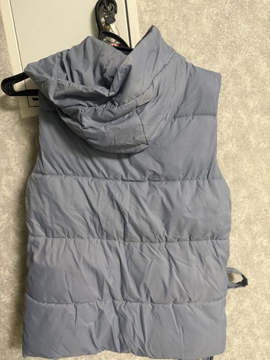 Жіноча жилетка/безрукавка