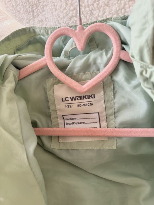 Вітровка фісташкова у розмірі 80 - 92 та боді Next у розмірі 92