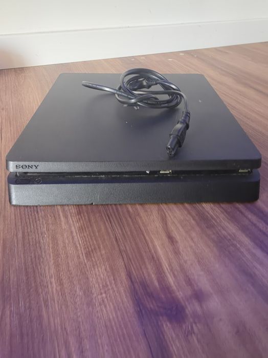Vendo PS4 Slim em bom estado e totalmente funcional + Jogo Just Cause 3 como novo  + comando original