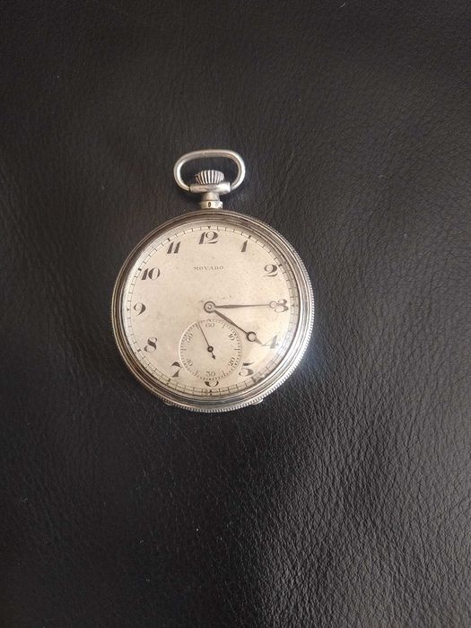 Antigo relogio de bolso Movado, em prata. Trabalha muito bem