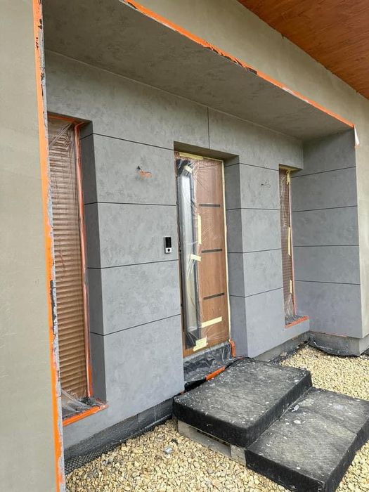Beton architektoniczny tynki dekoracyjne elewacja płyty mikrocement