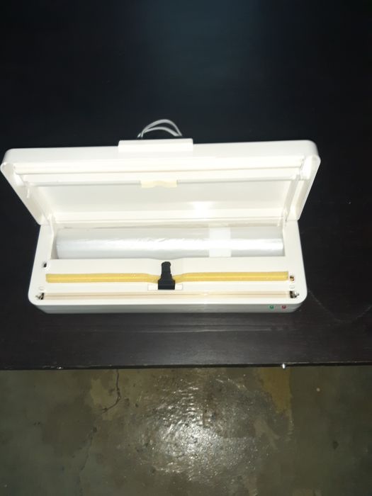 Máquina de fechar sacos de plástico