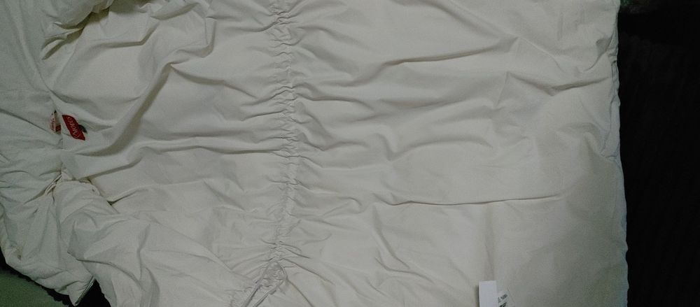 Пуховик молочний modus