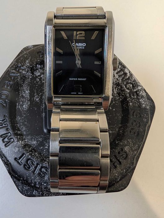 Часы Casio MTP-1235, чёрный циферблат, металлический браслет
