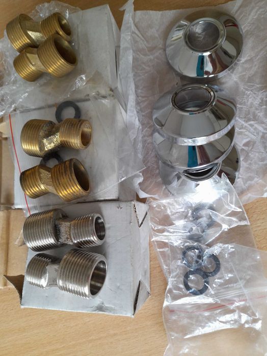 Zestaw: zawory, uszczelki, nakladki do baterii.