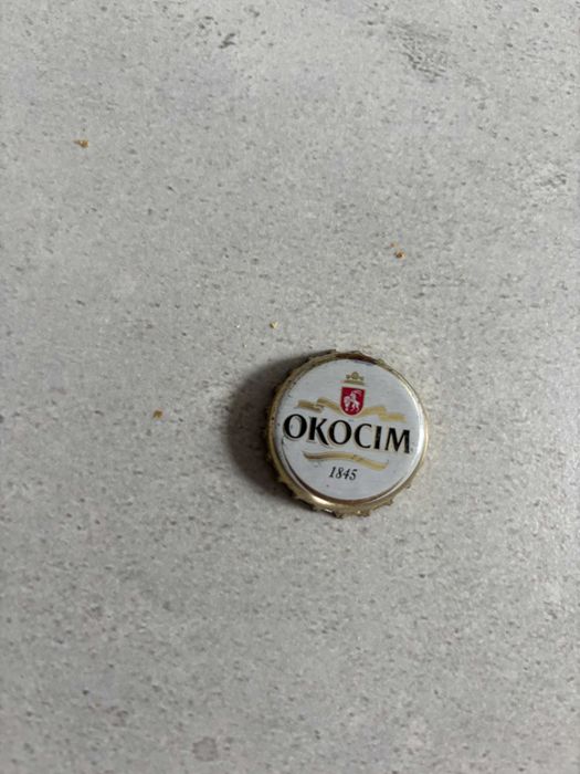 kolekcjonerske kapsle od piwa Okocim