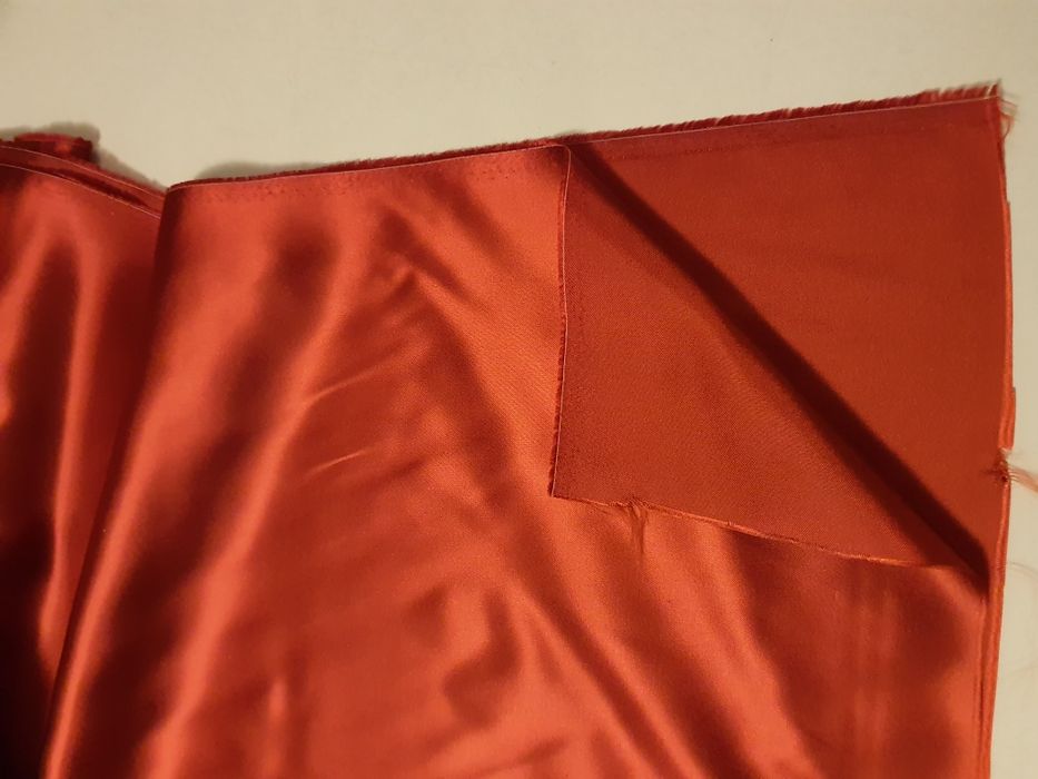 Podszewka ciemny pomarańcz szer.144 cm.