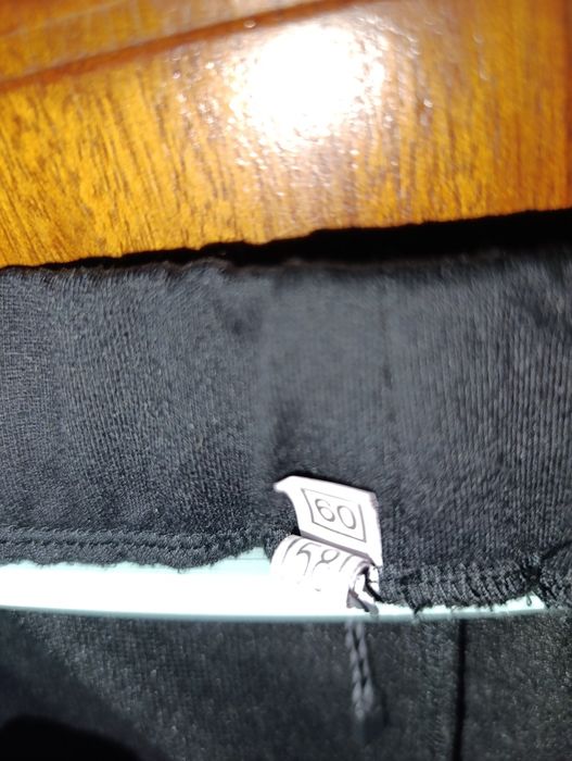 Штани кльош 58-60 розмір чорного кольору