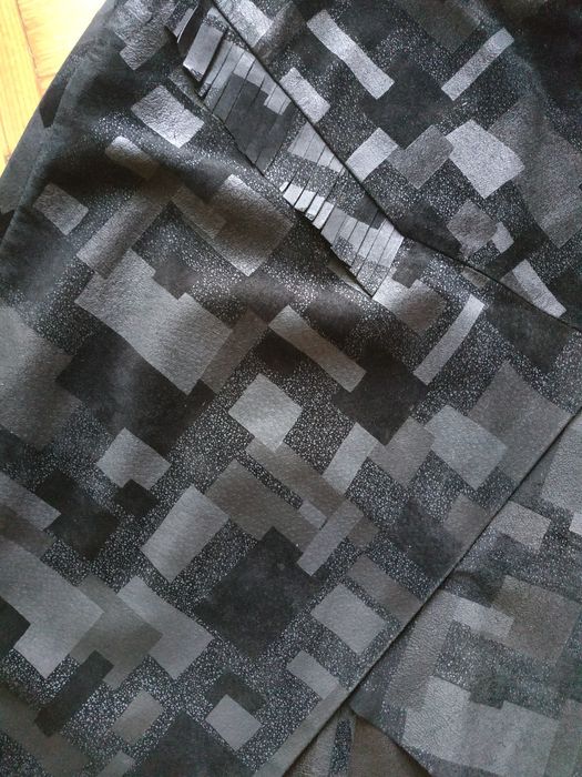 Кожаная юбка асимметричного кроя