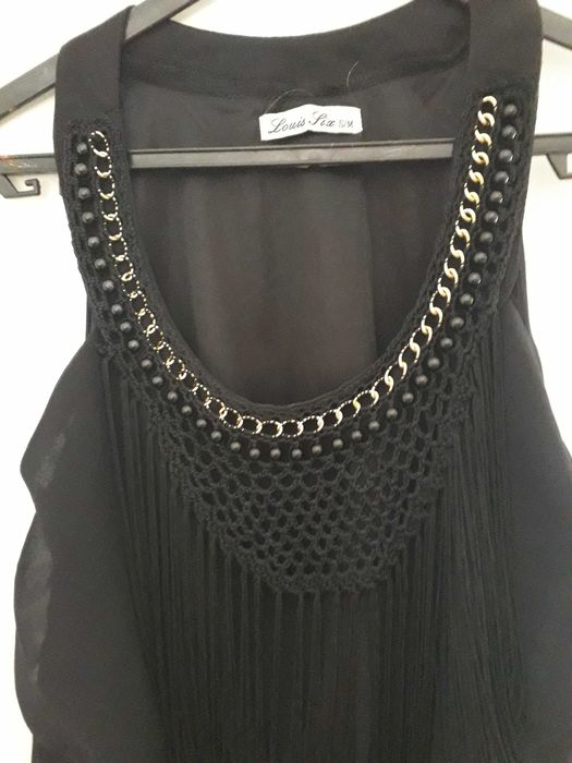 Top preto, Louis Six