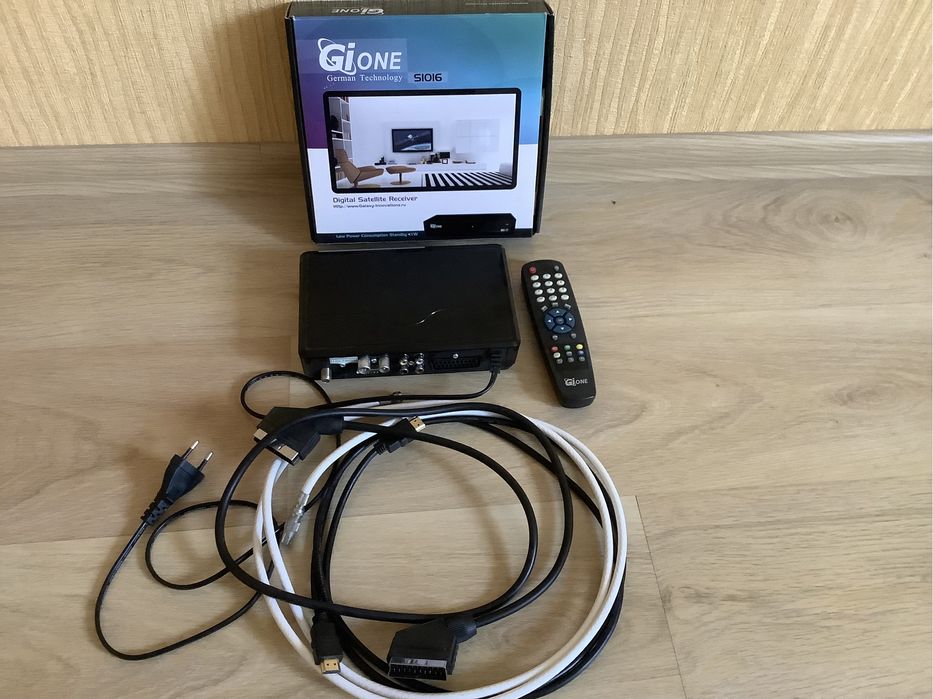 Спутниковое ТВ, тарілка, тюнер.