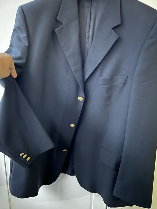 Casaco azul escuro botões dourados