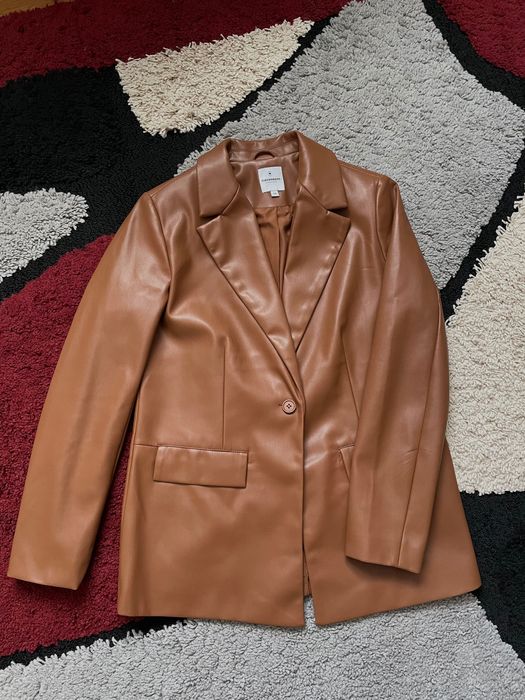Піджак рудого відтінку