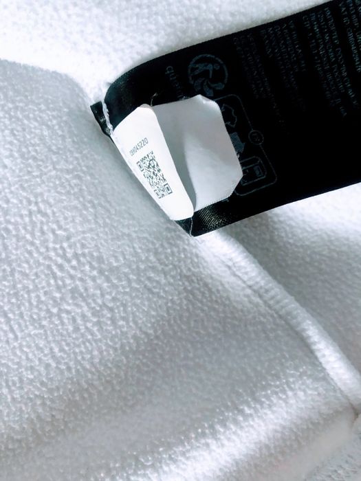 Жіноча біла флісова кофта  The North Face.