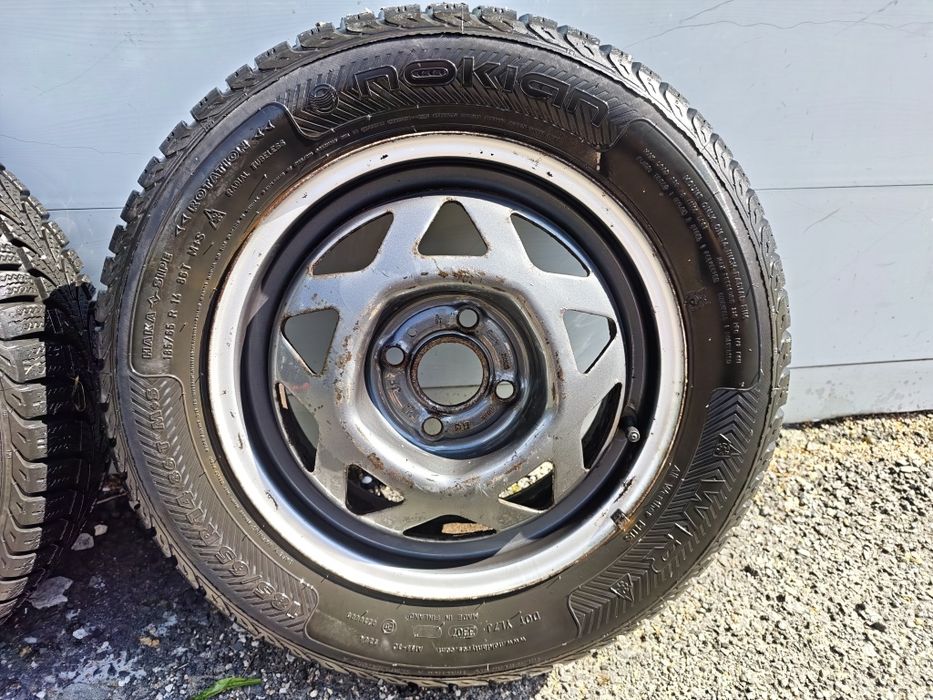 Komplet felg stalowych 14 4x100 et43 opony zimowe nokian 185/65R14 Opel Honda