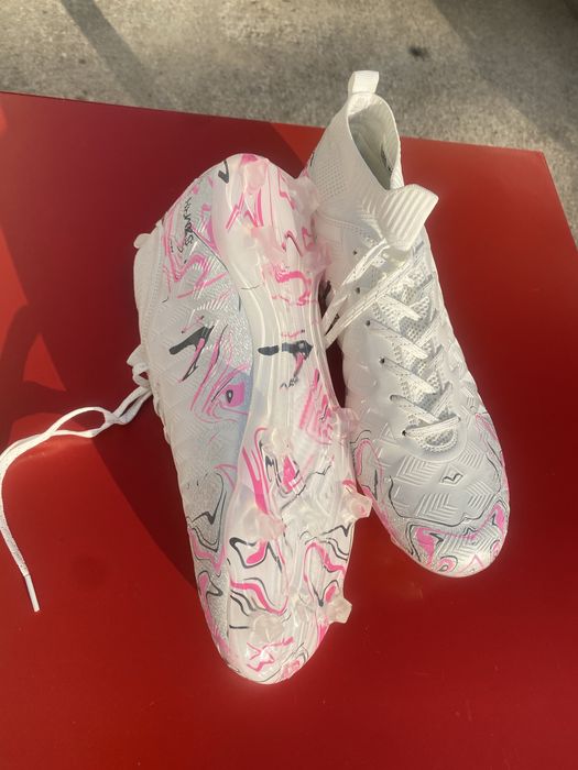 Chuteiras com pitons