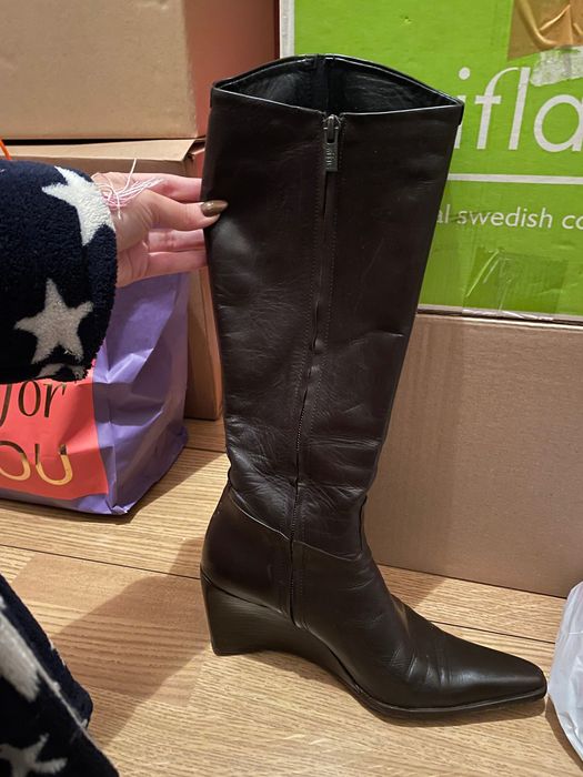 Botas em pele da strenna