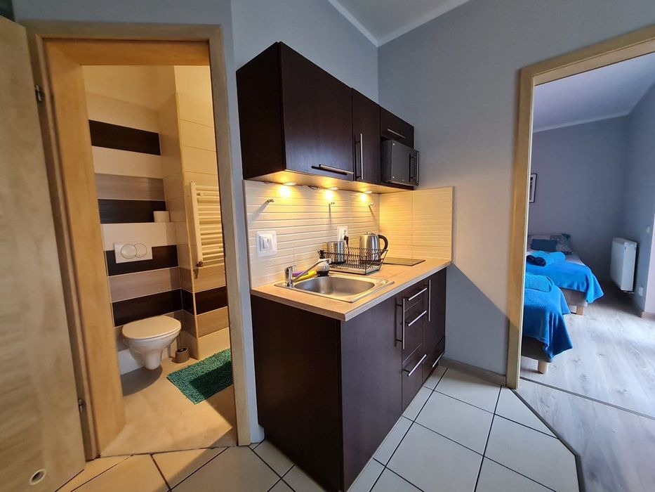 Bela-apartamenty, bezpłatny parking, faktura