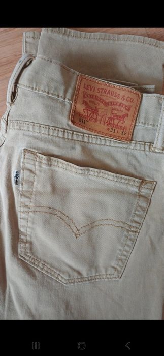 Damskie spodnie Levi's stan bardzo dobry rozmiar M beżowe jasne