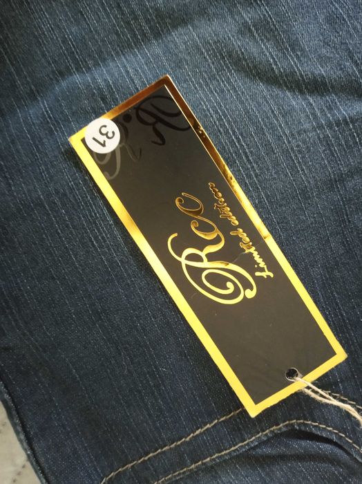 spodnie dżinsowe za kolana damskie, Nowe