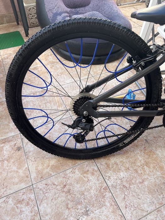Bicicleta st100 com destaques em azul NEGOCIALVEL